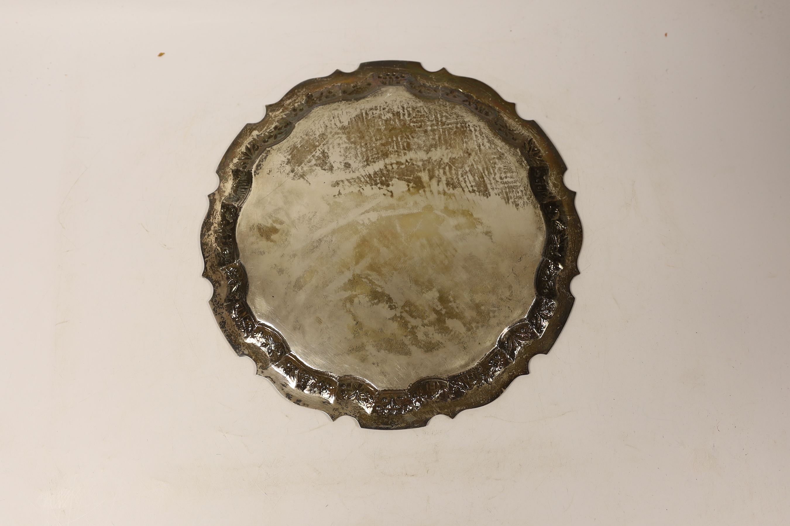 An Indian white metal presentation salver, engraved with signatures, 28.1cm, 19.7oz.